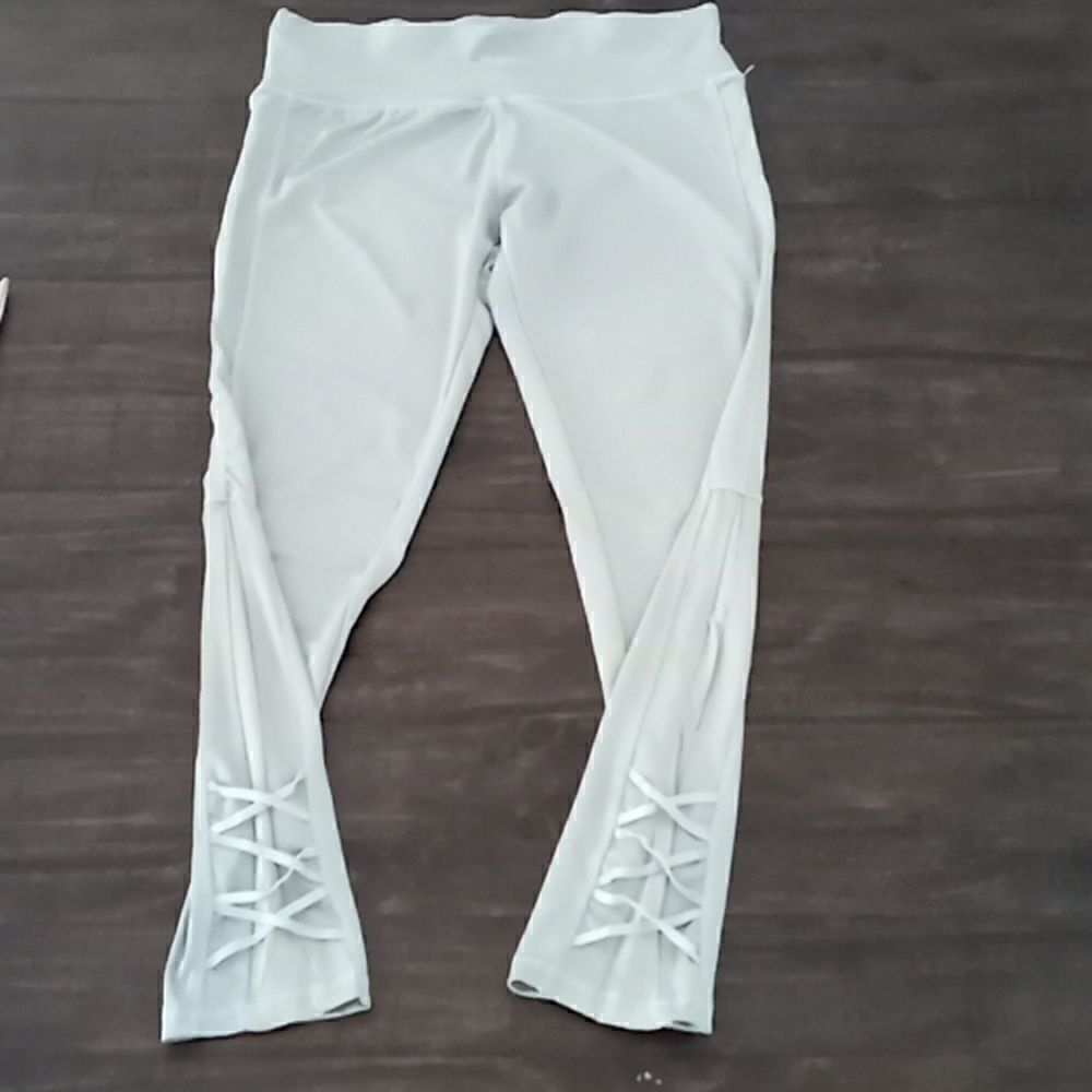 High waist light green leggings size large mesh laced ankles small stain on righ